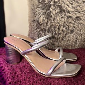 Metallic silver Heals